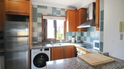2-bed-almonte-upstairs-apartment-on-la-finca-golf-kitchen-bar