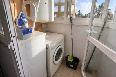 Neat-utility-room-with-sunny-balcony