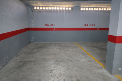 Empty-well-lit-parking-space-spots