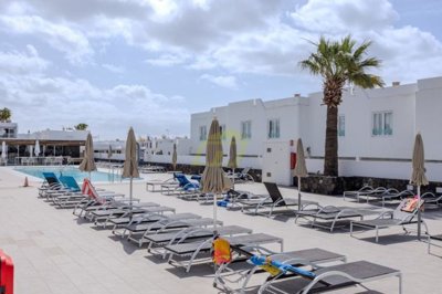 2 Bedroom apartment in sought after complex with heated pool and pool bar