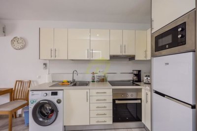 2 Bedroom apartment in sought after complex with heated pool and pool bar