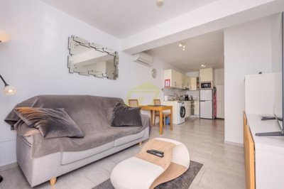 2 Bedroom apartment in sought after complex with heated pool and pool bar