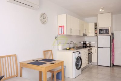 2 Bedroom apartment in sought after complex with heated pool and pool bar