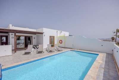 Stylish villa with private pool, garage, and sea views in Playa Blanca