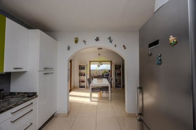 Tranquil countryside villa with panoramic views, spacious living, and mature gardens