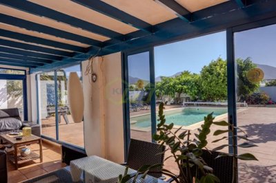 Spacious Playa Blanca villa with pool, guest apartment, and potential.