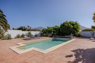 Spacious Playa Blanca villa with pool, guest apartment, and potential.