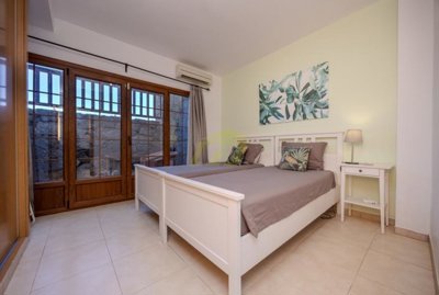 Must see villa with heated private pool and corner plot a few minutes away from Playa Flamingo.