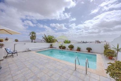 Stylish Los Altos villa exclusively with Lanzarote Investments 4 bedrooms, private pool, garage, and sea views