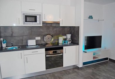 A stunning apartment with pool and sea views