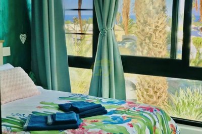 Sea view studio apartment with communal pool