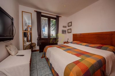 Peaceful living with roof views & pool access in gated complex