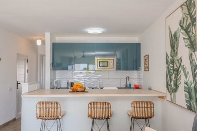 A fully renovated property with beautiful views in a private complex.