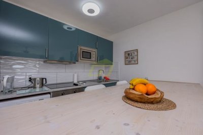 A fully renovated property with beautiful views in a private complex.