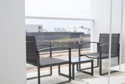 Contemporary south facing villa with roof terrace and 360º views in Playa Blanca