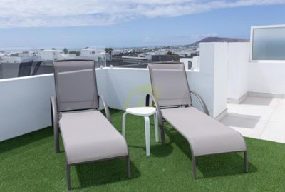 Contemporary south facing villa with roof terrace and 360º views in Playa Blanca