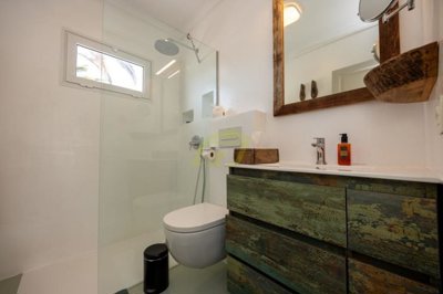 Coastal luxury villa featuring three independent apartments and serene ocean living