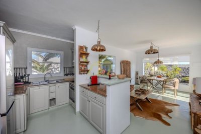 Coastal luxury villa featuring three independent apartments and serene ocean living