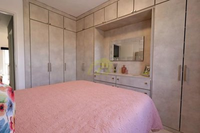 Immaculately presented first floor apartment with communal pool in great location