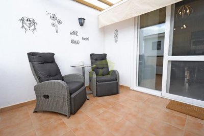 Immaculately presented first floor apartment with communal pool in great location