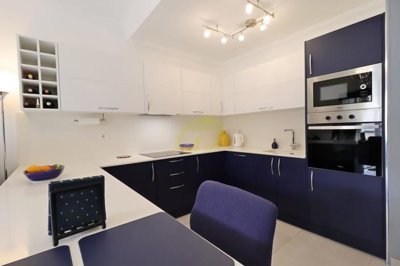 Immaculately presented first floor apartment with communal pool in great location