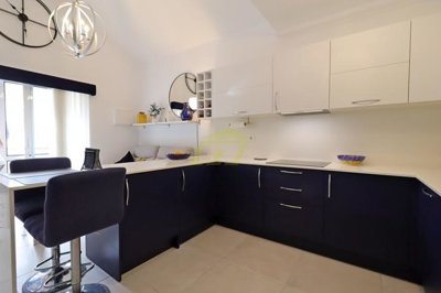 Immaculately presented first floor apartment with communal pool in great location