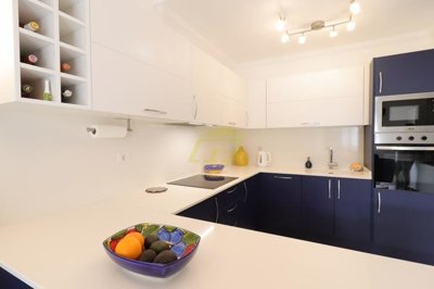 Immaculately presented first floor apartment with communal pool in great location