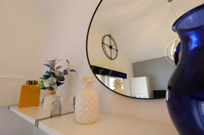 Immaculately presented first floor apartment with communal pool in great location