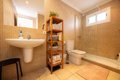 A beautifully presented first floor apartment with communal pool and storage included