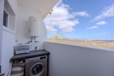 A beautifully presented first floor apartment with communal pool and storage included