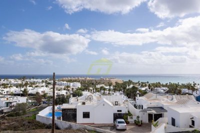 A beautifully presented first floor apartment with communal pool and storage included