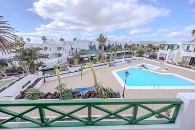 A beautifully presented first floor apartment with communal pool and storage included