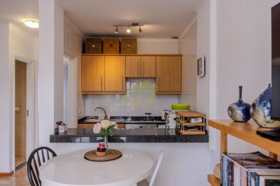 A beautifully presented first floor apartment with communal pool and storage included