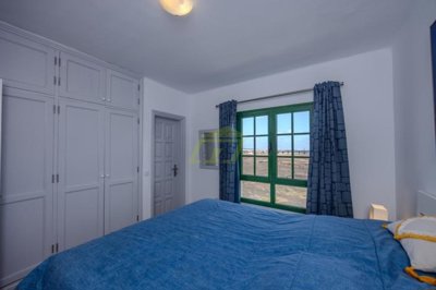 A beautifully presented first floor apartment with communal pool and storage included