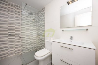 Ground floor 2 bedroom property with pool views