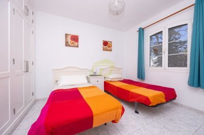 Ground floor 2 bedroom property with pool views