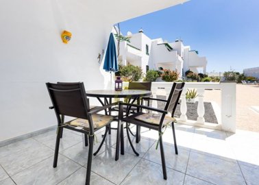 Ground floor 2 bedroom property with pool views