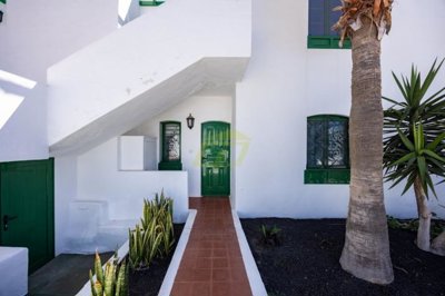 Ground floor 2 bedroom property with pool views