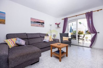 Ground floor 2 bedroom property with pool views