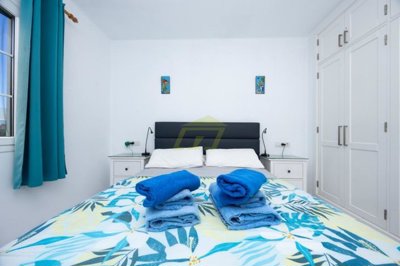 Ground floor 2 bedroom property with pool views