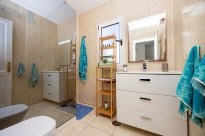 Semi-detached property with private garage