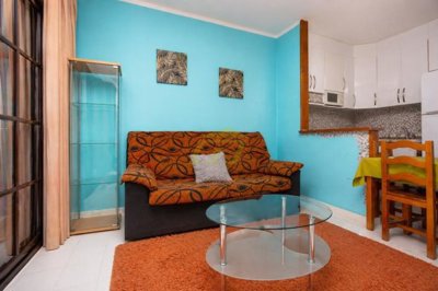 Spacious 1-Bedroom Apartment with Enclosed Terrace in Prime Puerto del Carmen Location
