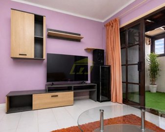 Spacious 1-Bedroom Apartment with Enclosed Terrace in Prime Puerto del Carmen Location