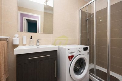 Spacious 1-Bedroom Apartment with Enclosed Terrace in Prime Puerto del Carmen Location
