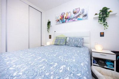 Immaculate apartment overlooking pool in private complex