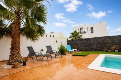 Playa Blanca gated gem with private pool and parking space.