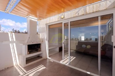Spacious frontline property moments from the beach with a communal pool
