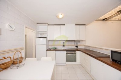 Spacious frontline property moments from the beach with a communal pool