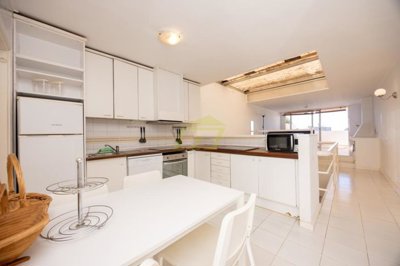 Spacious frontline property moments from the beach with a communal pool