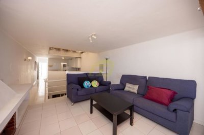 Spacious frontline property moments from the beach with a communal pool